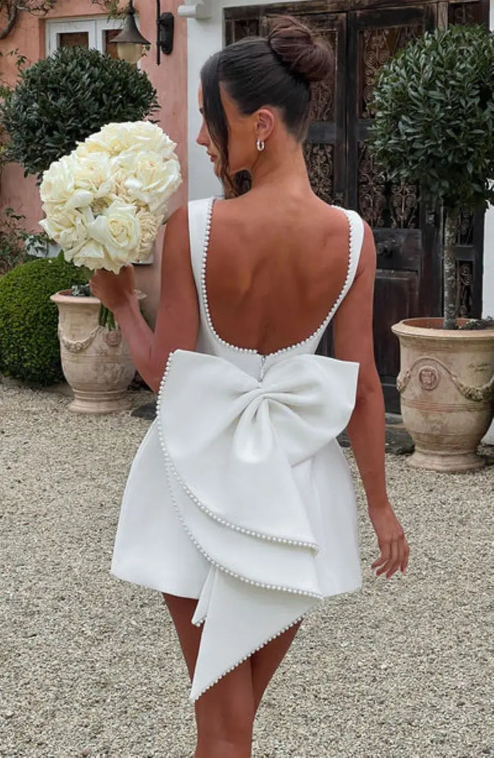 Women's Round Neck A-Line Wedding Guest Dress with Pearl Trim and Oversized Back Bow