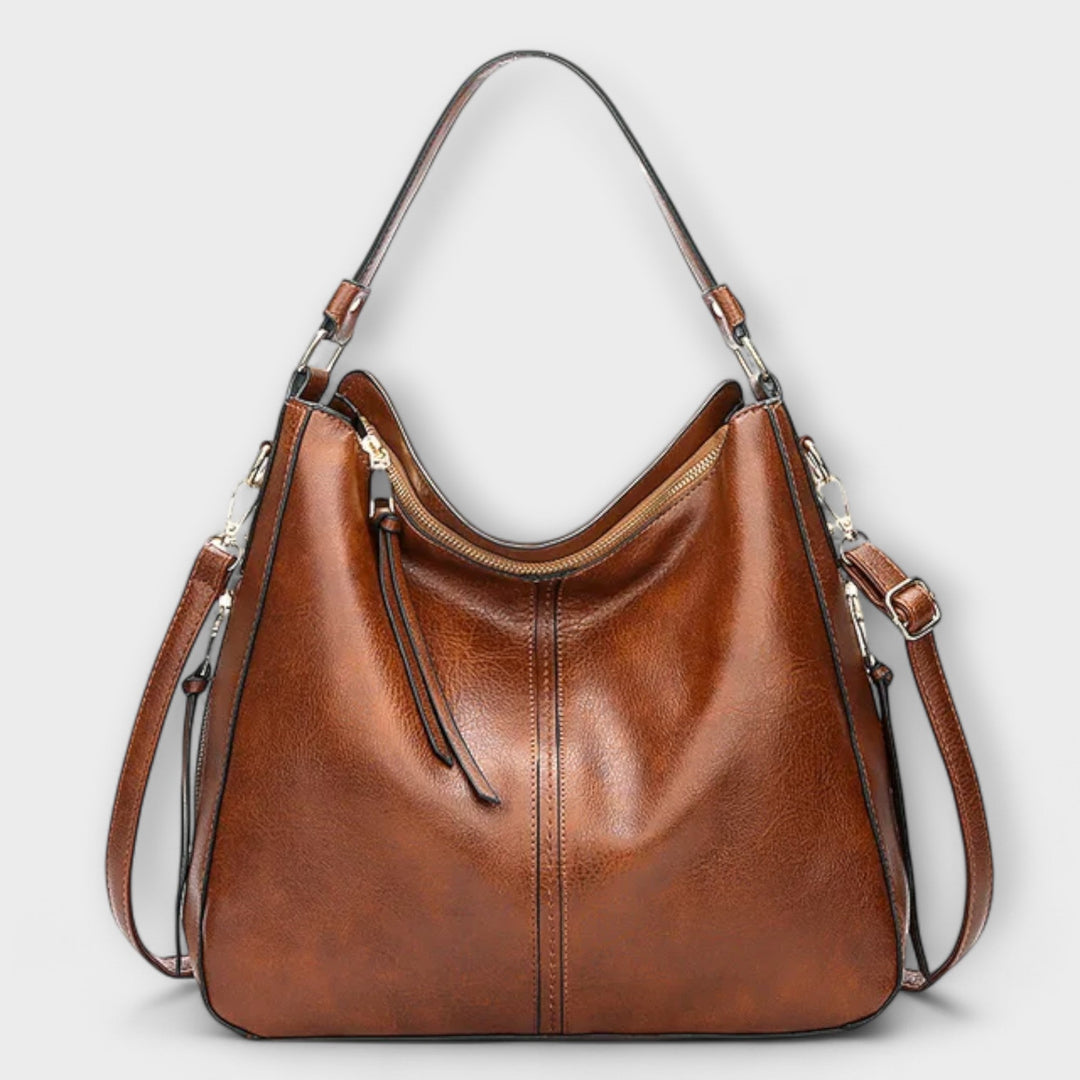 Women’s Adjustable Strap Shoulder Bag with Zipper and Tassels
