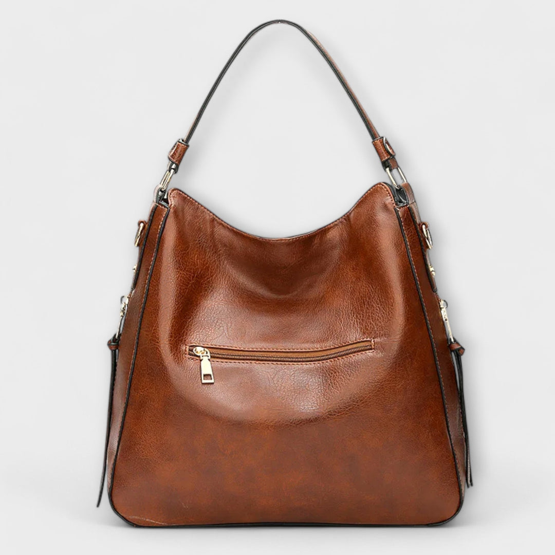 Women’s Adjustable Strap Shoulder Bag with Zipper and Tassels