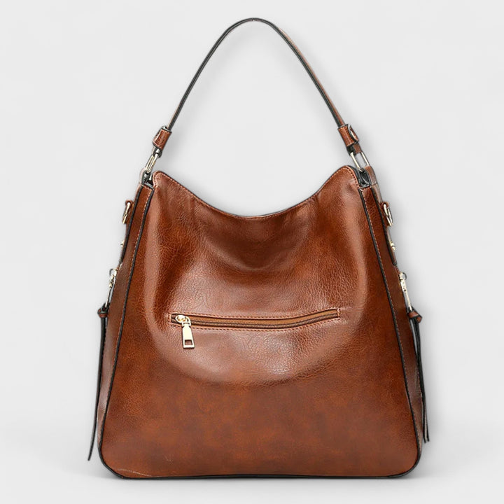 Women’s Adjustable Strap Shoulder Bag with Zipper and Tassels