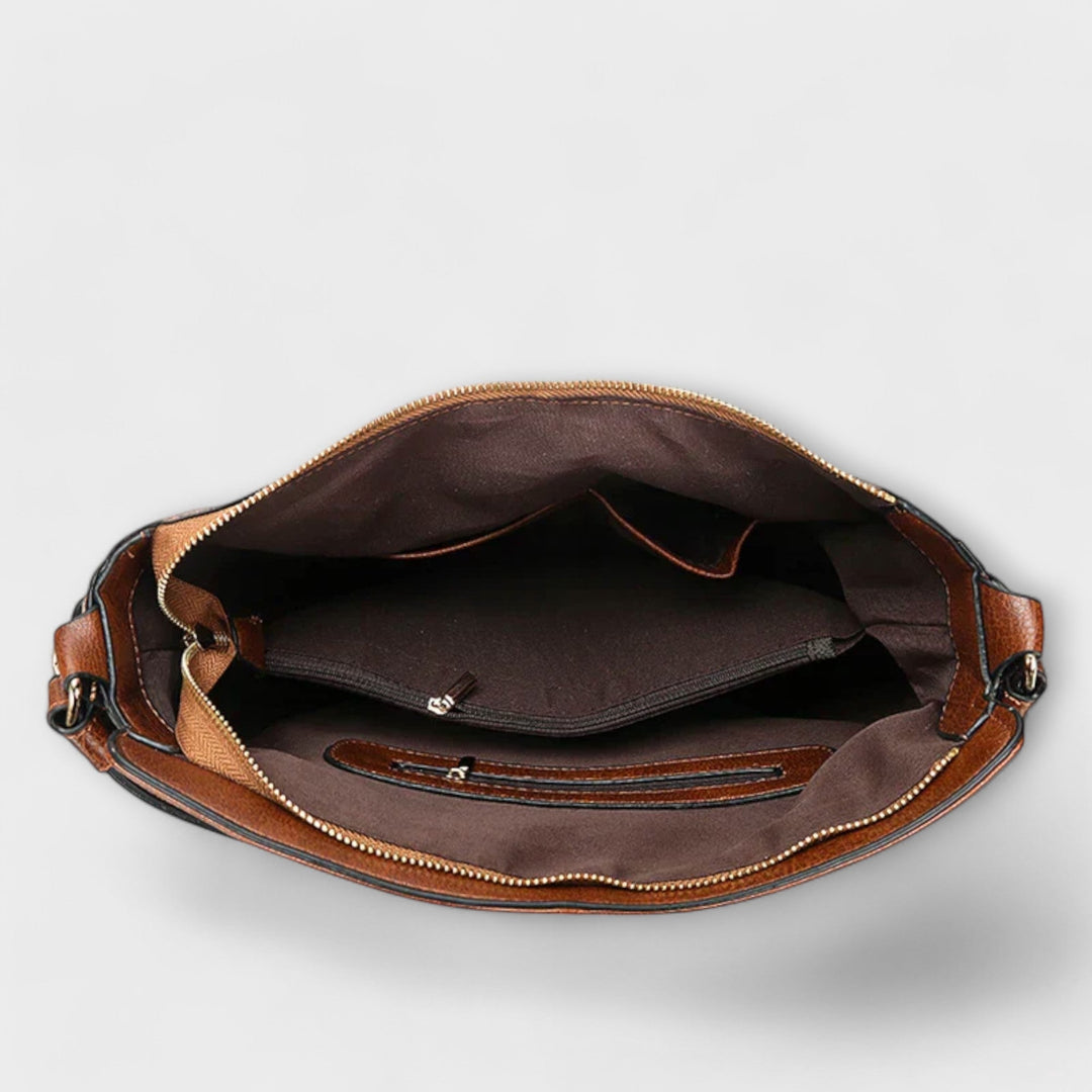 Women’s Adjustable Strap Shoulder Bag with Zipper and Tassels