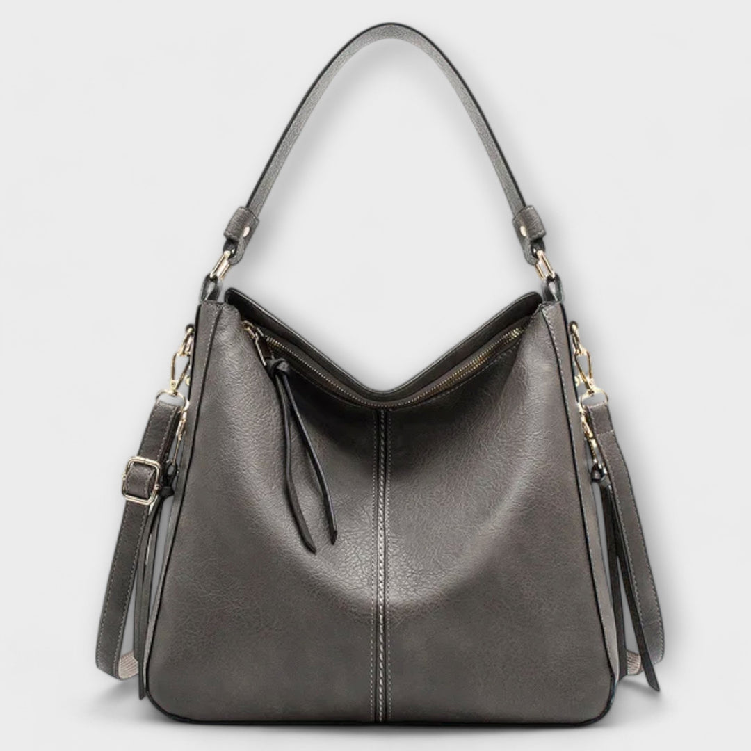 Women’s Adjustable Strap Shoulder Bag with Zipper and Tassels