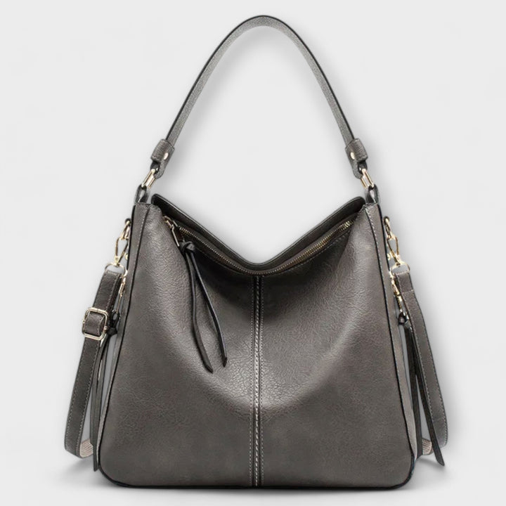 Women’s Adjustable Strap Shoulder Bag with Zipper and Tassels