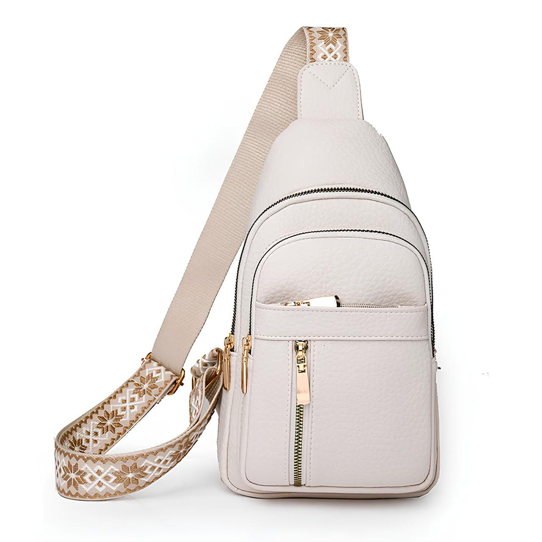 Women's Sling Bag with Geometric Pattern Strap and Multiple Zippered Compartments