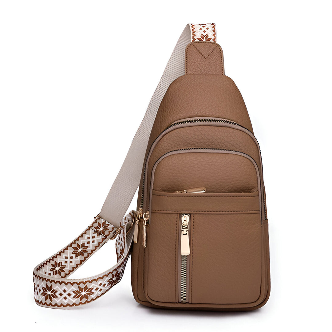 Women's Sling Bag with Geometric Pattern Strap and Multiple Zippered Compartments