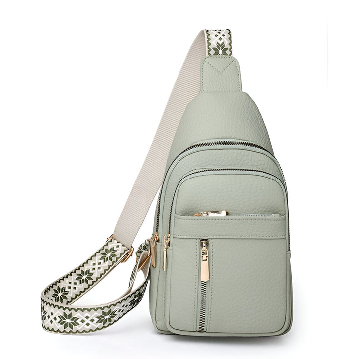 Women's Sling Bag with Geometric Pattern Strap and Multiple Zippered Compartments
